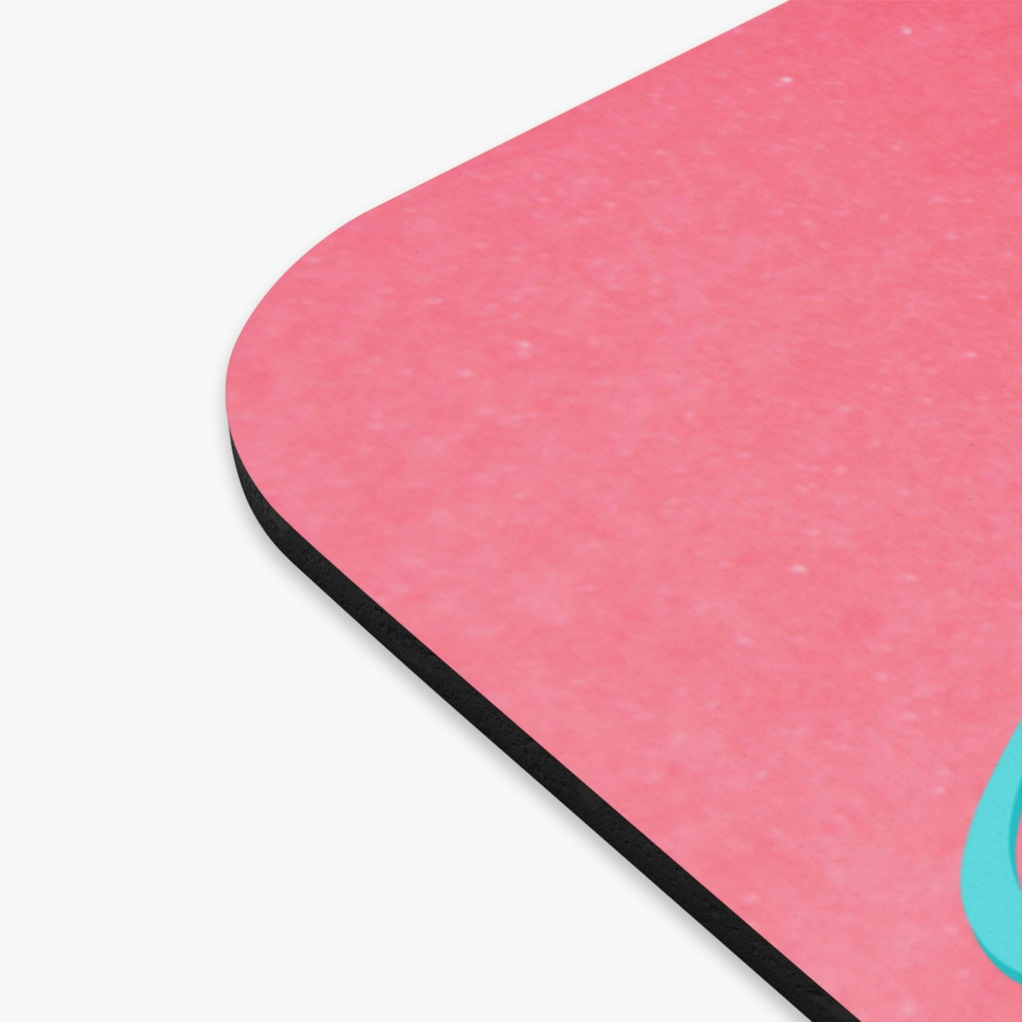 Blue Yellow Pink Mouse Pad with Real Mouse Beside a Blue and Silver Computer Mouse