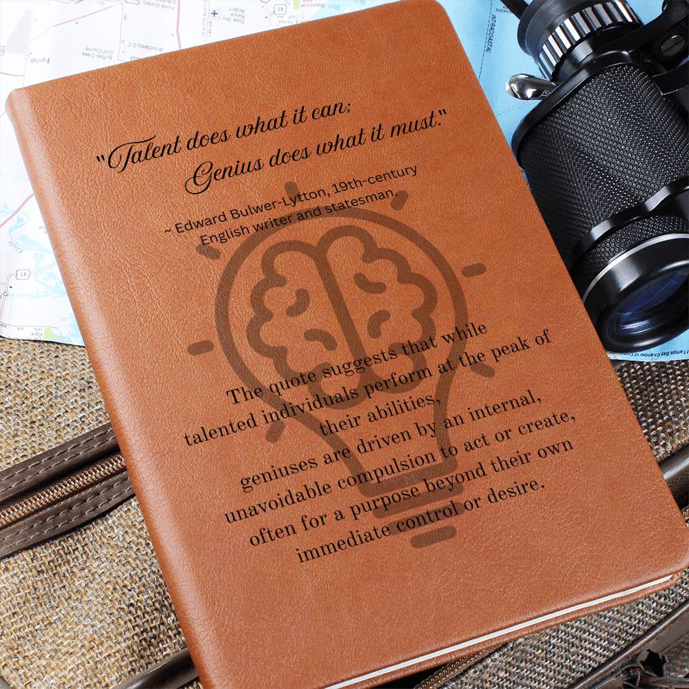 Close up image. Notebook journal with cover quote: Edward Bulwer-Lytton's "Talent does what it can; Genius does what it must." black text layered on a lightbulb on the brown vegan leather cover.