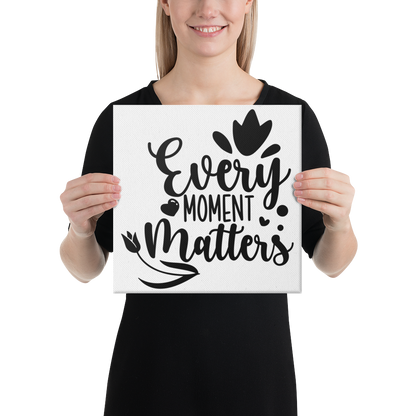 Every Moment Matters Square Canvas 12"x12" woman holding canvas at chest height