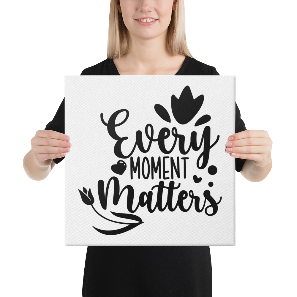 Every Moment Matters Square Canvas 16"x16" woman holding canvas at chest height