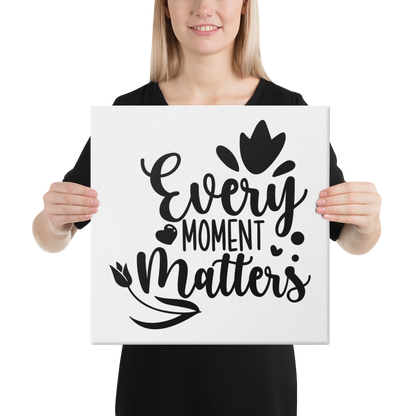 Every Moment Matters Square Canvas 16"x16" woman holding canvas at chest height